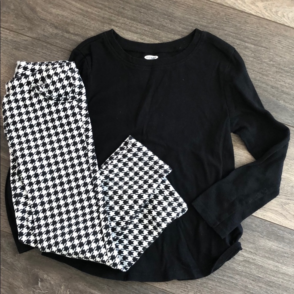 Black shirt and patterned pants